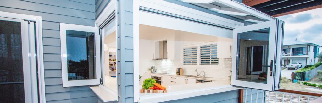 Aluminium-Bi-fold-Windows-with-grey-glass - Aluminium Windows and Doors: How to Select the Right Colour - Aluminium Windows and Doors: How to Select the Right Colour